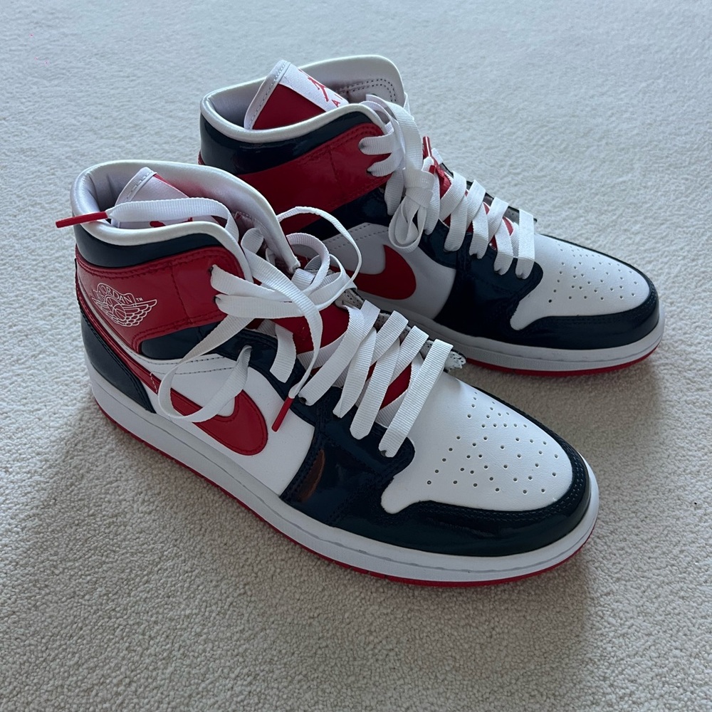 Women’s size 8 Nike air Jordans, red white & navy blue.